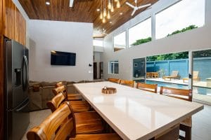 Kitchen area for Casa Fenix, chairs set out around and island for group lunch.